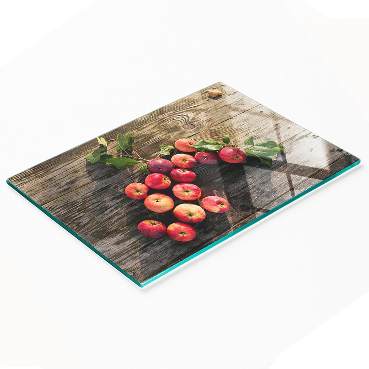 Decoratieve glazen snijplank voor het snijden van appels op tafel, 80x52 cm