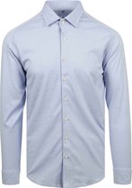 Chemise bleu clair à manches longues Desoto, fermeture boutonnée. La chemise est repassée.