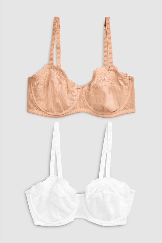 Set van twee strapless beha's in beige en wit, met kanten details en stippenpatroon.
