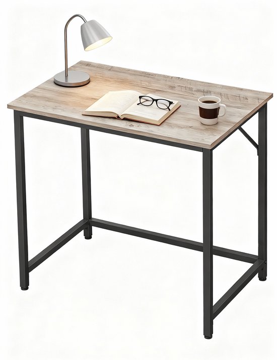 Bureau met licht houten blad en zwart metalen frame, met lamp, boek en mok.