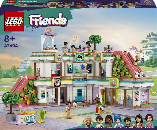 Boîte de LEGO Friends Centre Commercial avec 6 mini-poupées, un chariot à glaces et 2 toboggans. À partir de 8 ans.