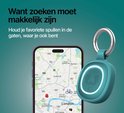 Turquoise tracker met lichtring, op de achtergrond een smartphone met kaart van Londen.