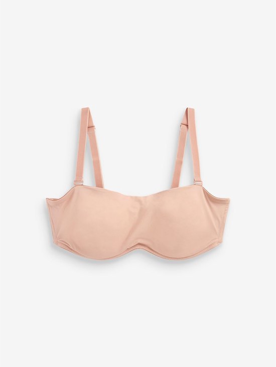 Huidkleurige strapless bh met afneembare bandjes.