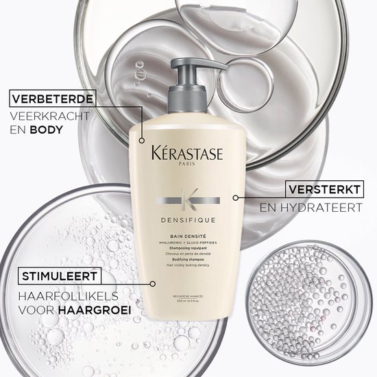 Kérastase Bain Densité fles in glazen laboratoria-apparatuur, met teksten 'VERSTERKT EN HYDRATEERT' en 'STIMULEERT HAARFOLLIKELS VOOR HAARGROEI'.
