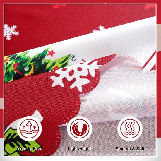 Detail van een rood kersttafelkleed met witte sneeuwvlokken en een rand met kerstbomen en bloemen. Kreukvrij, lichtgewicht, glad en zacht.