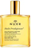 Gouden Nuxe Huile Prodigieuse multi-purpose dry oil in een glazen fles met gouden dop.