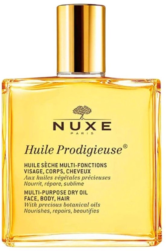 Gouden Nuxe Huile Prodigieuse multi-purpose dry oil in een glazen fles met gouden dop.