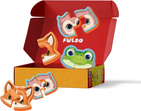 Open doos met puzzelstukken van een vos, uil en kikker. De binnenkant van de doos is rood.
