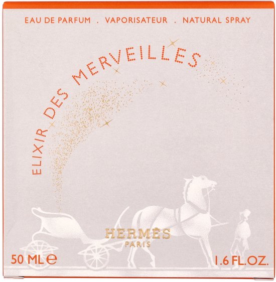 Grijze doos voor Elixir des Merveilles eau de parfum met oranje rand. Opdruk van een paard, koets en gouden glitters. '50 ml 1.6 FL.OZ.'