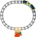 Train LEGO Duplo sur une piste circulaire avec des wagons vert clair.