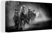Canvas Schilderij Kudde Quarter paarden in vroeg morgenlicht - zwart wit - 40x20 cm - Wanddecoratie