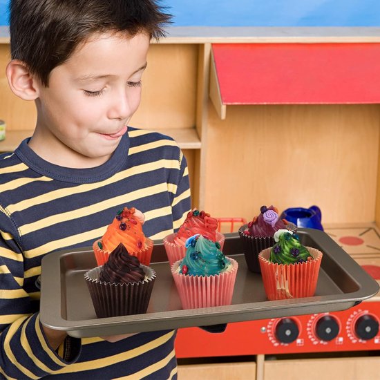 koekjes bakplaat is een universele bakplaat voor de oven in zwart