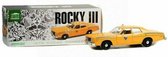 De 1:18 Modelauto van de Dodge Monaco Taxi City van 1982 van de film Rocky III. De fabrikant van het schaalmodel is Greenlight.Dit model is alleen online beschikbaar.