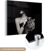 MuchoWow® Glasschilderij 40x30 cm - Schilderij acrylglas - Vrouw - Luipaard - Luxe - Zwart - Wit - Dier - Foto op glas - Muurdecoratie woonkamer - Wanddecoratie slaapkamer - Schilderijen