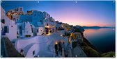 Schuttingposter Vissersdorp Oia bij Santorini Griekenland met zonsopkomst - 200x100 cm - Tuindoek