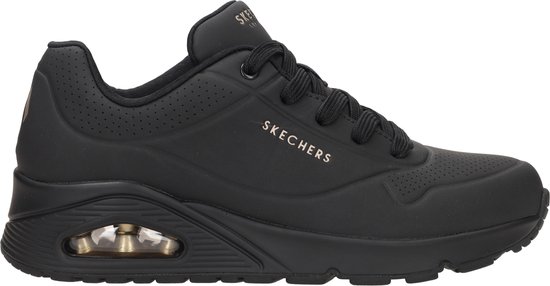 Zwarte Skechers Uno damessneaker met gouden accenten en air-unit in de zool.