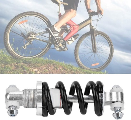 Zilverkleurige fiets schokdemper met zwarte veer, diagonaal geplaatst.