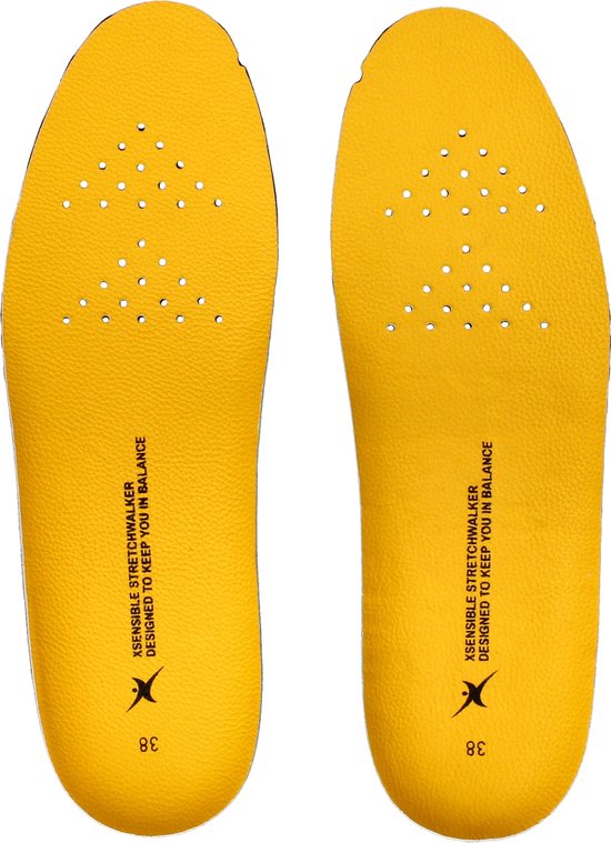 Twee gele inlegzolen met perforaties en "Xsensible Stretchwalker" tekst.
