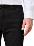 Detail van de zak en knoop van een zwarte Wrangler jeans.