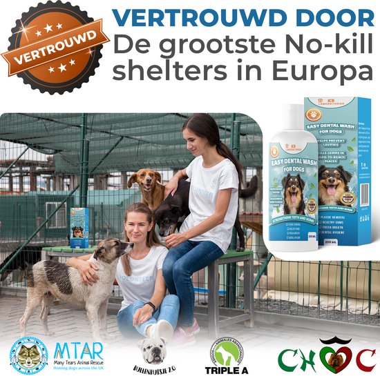Twee vrouwen met honden bij een dierenasiel, met K9 Laboratories Easy Dental Wash voor honden op een tafel. De tekst luidt 'Vertrouwd, de grootste No-Kill shelters in Europa'.