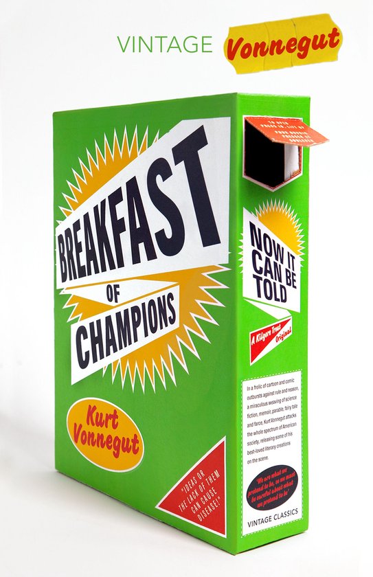 Groen boek in de vorm van een ontbijtgranendoos met de titel 'Breakfast of Champions' en een gele, opvallende, gelamineerde afwerking aan de bovenkant.