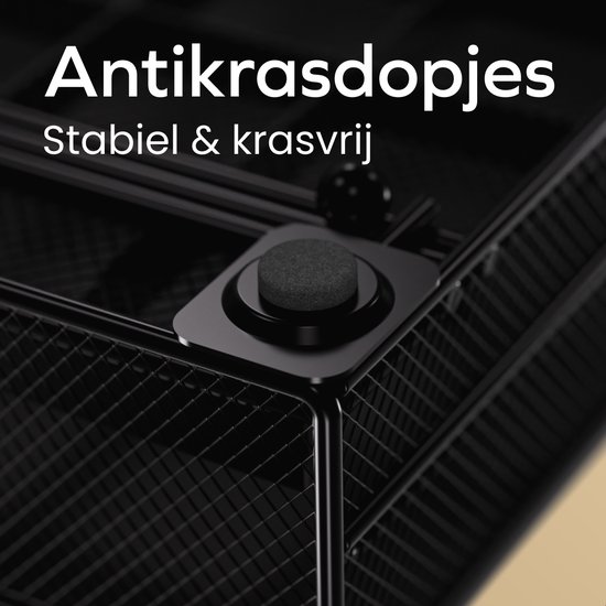 Detail van een zwart antiekrasdopje op de poot van de capsulehouder.