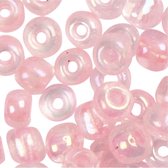 Rocailles. roze kern. d: 3 mm. afm 8/0 . gatgrootte 0.6-1.0 mm. 500 gr/ 1 doos