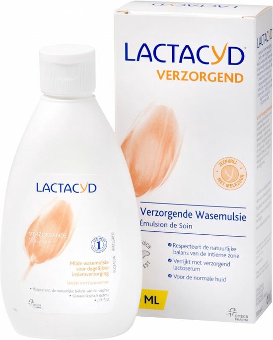 Lactacyd verzorgende wasemulsie met een flesje en doosje, afgebeeld met een perzikachtige bloem.