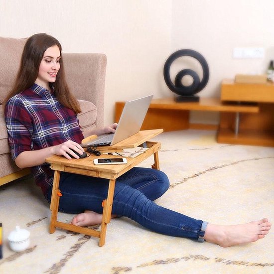 Table pour ordinateur portable sur les genoux devant le lit ou sur le  canapé en bois