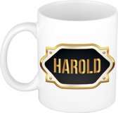Naam cadeau mok / beker Harold met gouden embleem 300 ml