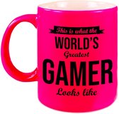 Worlds Greatest Gamer cadeau koffiemok / theebeker neon roze 330 ml