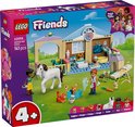 Boîte LEGO Friends Clinique Vétérinaire : cheval, figurines, chats, chiots et lapin.
