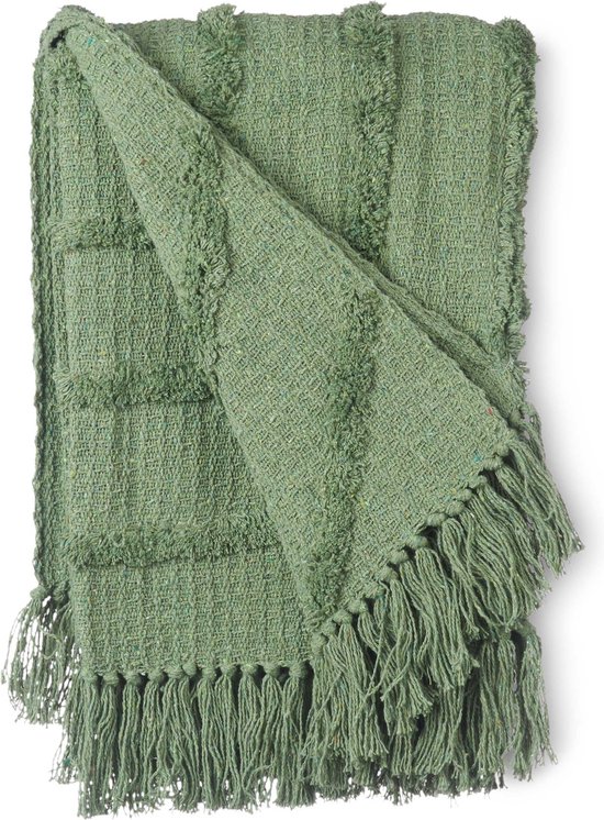 Gevouwen lichtgroene plaid met franjes aan alle zijden. De stof heeft een geweven textuur.