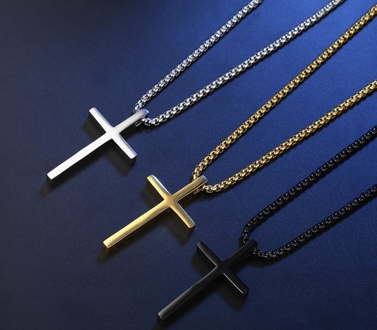 Drie kruiskettingen in zilver-, goud- en zwarttinten, naast elkaar op een donkere achtergrond.