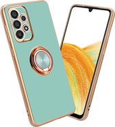 Cadorabo Hoesje geschikt voor Samsung Galaxy A52 (4G / 5G) / A52s in Glossy Turquoise - Goud met ring - Beschermhoes van flexibel TPU-silicone Case Cover met camerabescherming en magnetische autohouder