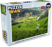 Puzzel Vrouw staat in een rijstveld in Indonesië - Legpuzzel - Puzzel 1000 stukjes volwassenen