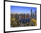 Fotolijst incl. Poster - De skyline van de Dubai Marina in de schemering - 90x60 cm - Posterlijst