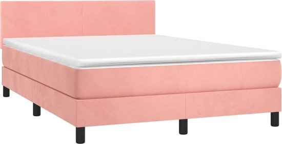 Lit boxspring rose avec tête de lit et matelas, sur pieds noirs.