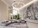 Een moderne lobby met modulaire grijze banken, een groot tapijt met een klassiek patroon en een muurschildering.