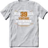 39 Jaar Legend T-Shirt | Goud - Wit | Grappig Verjaardag en Feest Cadeau Shirt | Dames - Heren - Unisex | Tshirt Kleding Kado | - Licht Grijs - Gemaleerd - 3XL
