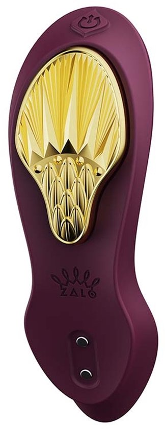 Vibrateur violet avec accent doré plié et logo Zalo.