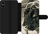 Bookcase Geschikt voor iPhone X telefoonhoesje - Schotse Hooglander - Sneeuw - Horens - Met vakjes - Wallet case met magneetsluiting