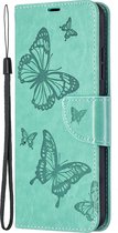 Mobigear Telefoonhoesje geschikt voor Nokia 1.4 Hoesje | Mobigear Butterfly Bookcase Portemonnee | Pasjeshouder voor 2 Pasjes | Telefoonhoesje voor Pinpas / OV Kaart / Rijbewijs - Turquoise