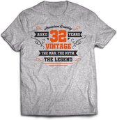 32 Jaar Legend - Feest kado T-Shirt Heren / Dames - Antraciet Grijs / Oranje - Perfect Verjaardag Cadeau Shirt - grappige Spreuken, Zinnen en Teksten. Maat S