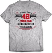 42 Jaar Legend - Feest kado T-Shirt Heren / Dames - Antraciet Grijs / Rood - Perfect Verjaardag Cadeau Shirt - grappige Spreuken, Zinnen en Teksten. Maat XXL