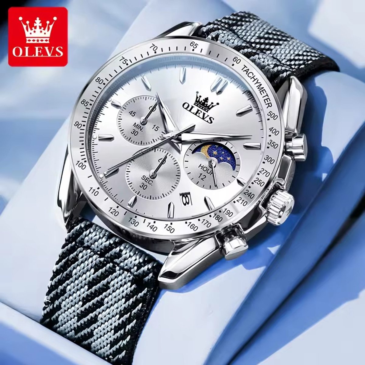 HO-3630.z : Olevs zilverkl edelstaal horloge, chronografisch, tachymeter, zilverkl wijzerplaat, seconden minuten uur-maanfase aanduiding