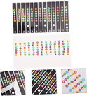Overzicht van gitaartuner stickers. Drie close-ups tonen de stickers met noten en halve noten, en het loskomen van een sticker.