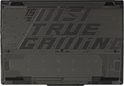 Onderkant van de zwarte MSI gaming laptop met 'JUST TURE GAMING' tekst en ventilatiegroeven.