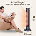 Een zwarte staande infrarood verwarming met koperkleurige gloeiende elementen, naast een man op een zitzak, met afmetingen 33.2 inch L en 10.2 inch D.
