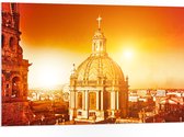 PVC Schuimplaat - Top van St-Pietersbasiliek Kerk in Vaticaanstad onder Felle Zon - 105x70 cm Foto op PVC Schuimplaat (Met Ophangsysteem)